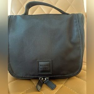 Herve Leger hanging toiletries bag